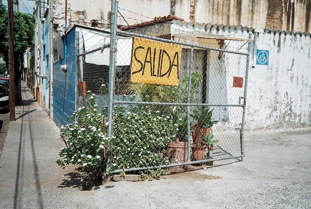 A fence with a sign that says sada on it