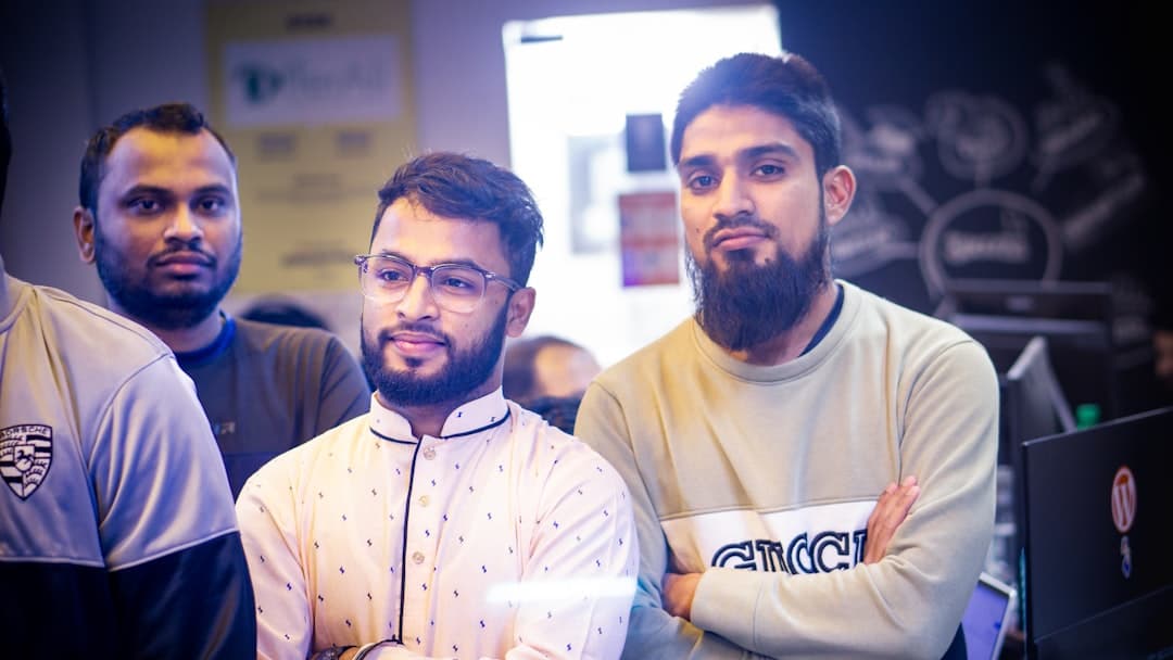 A group of men standing next to each other