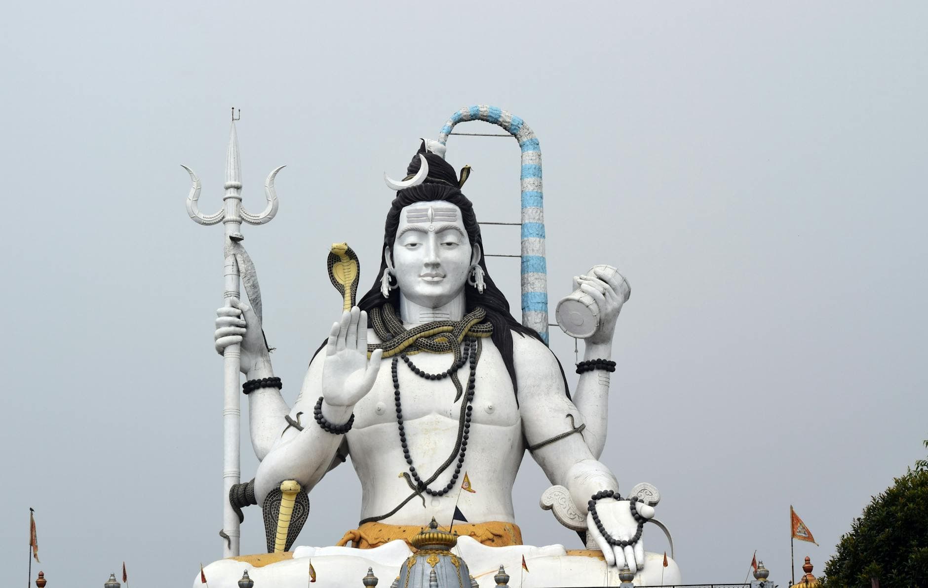 Impressive statue of Lord Shiva against a clear sky in Gangtok, Sikkim, India.